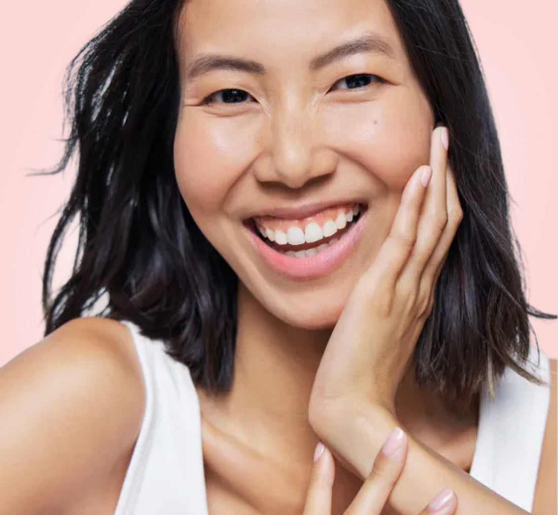 Smiling woman feeling fresh and confident, from the Love Wellness