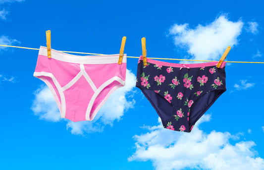 Cotton underwear drying outdoors in sunlight