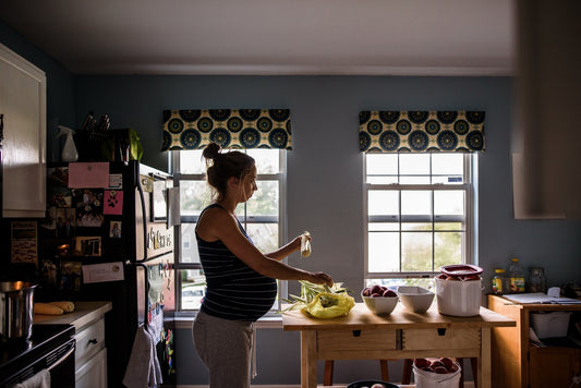 Woman preparing food for gut health during pregnancy